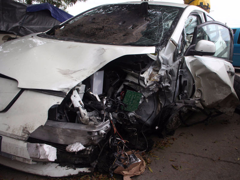 White crashed car